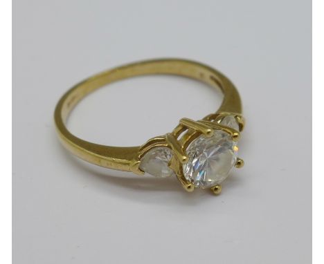 A 9ct gold and cubic zirconia, three stone ring, 2.5g, R