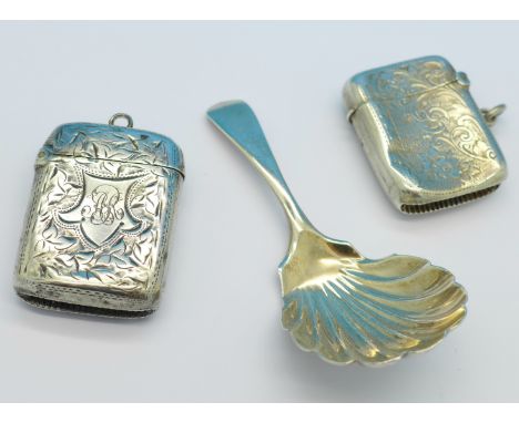 Two silver vesta cases and a silver caddy spoon