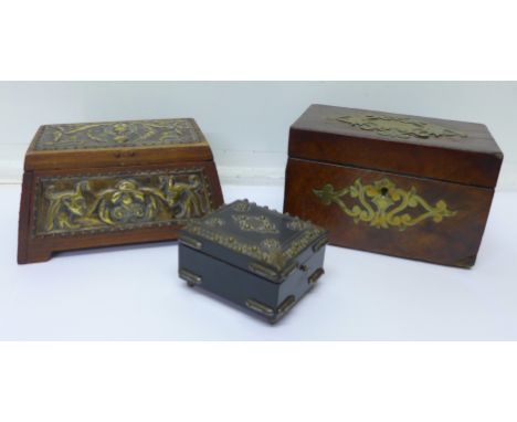An Art Nouveau Egyptian revival box, a George III tea caddy and an ebonised box