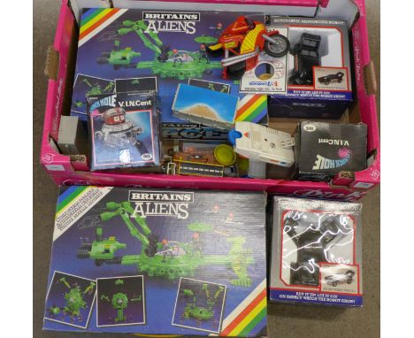 Two Britains Space Aliens toys, two Pow-R-Tron battery operated vehicles and two V.I.N. Cent figures, all boxed, etc.