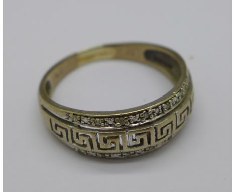 A 9ct gold and diamond ring, 2.6g, R