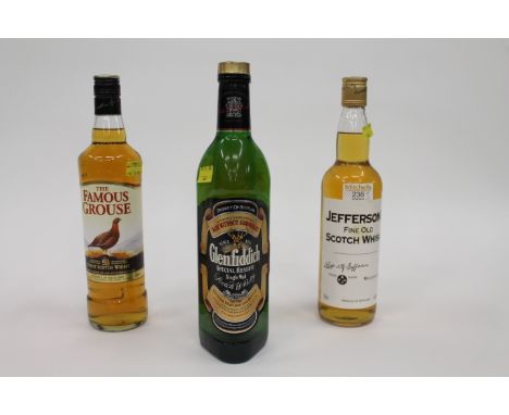 Three bottles of Whisk, Jeffersons Old Fine Scotch Whisky from Whitehaven, Glenfiddich and Famous Grouse 