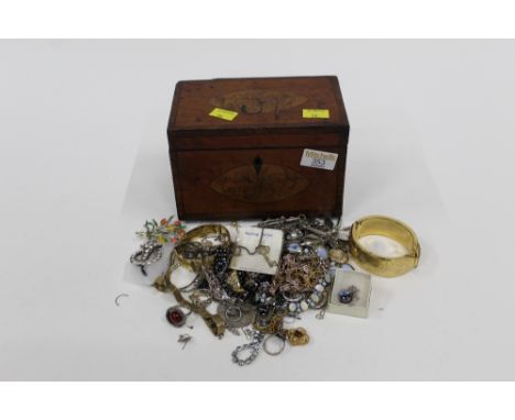 Tea caddy of costume jewellery 