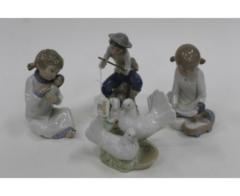 Nao figure of boy with goat and three other figurines