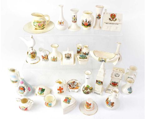 A large quantity of crested ware to include Bavarian, Arcadian, Goss examples, etc, vases, including models of longcase clock