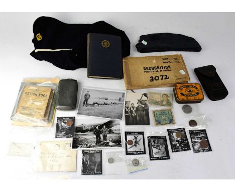 A mixed military lot to include a Royal Naval jacket, an RAF hat, a WWII Navy Department Recognition Manual, no.3072, persona