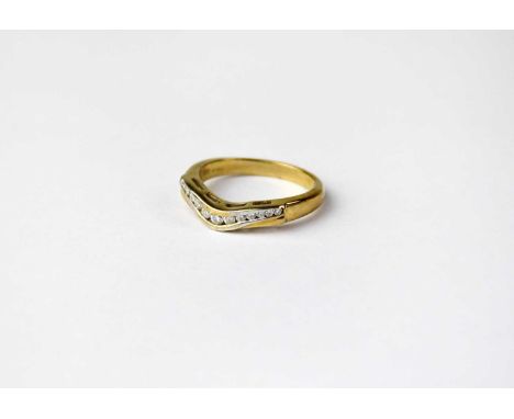 A 9ct gold wishbone-shaped ring set with diamonds, stamped 375, size M, approx. 2.8g.