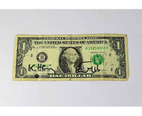 KEITH HARING; a US $1 bill bearing the artist's signature and 'Baby' doodle in black marker.Provenance: We have not authentic