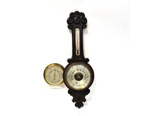 A mid-20th century oak banjo barometer with silvered dial and thermometer, height 80cm together with a brass wall mounted Sho