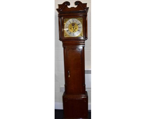 THOMAS KNOWLES; an 18th century thirty hour oak longcase clock, the silvered chapter ring set with Roman numerals, inner bras