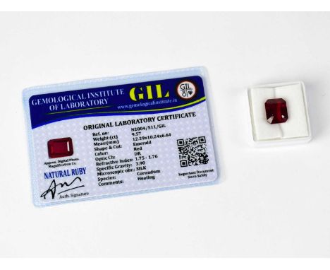 A loose 9.57 carat emerald-shaped ruby with GIL laboratory certificate.