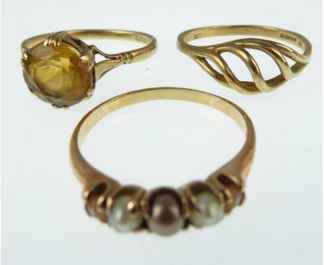 Three 9ct gold rings, one set with five graduated cultured pearls, size M, one set with single orange-coloured stone, Size O,