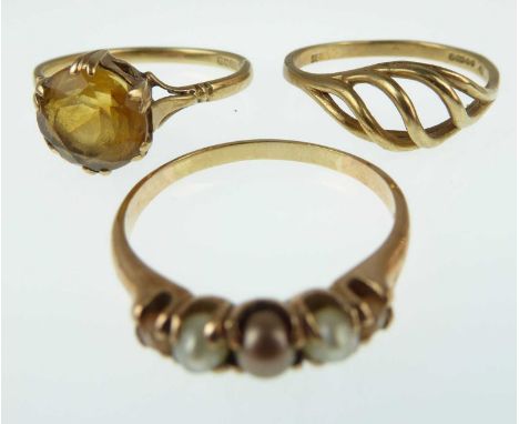 Three 9ct gold rings, one set with five graduated cultured pearls, size M, one set with single orange-coloured stone, Size O,