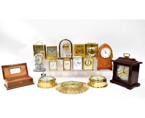 A quantity of modern clocks to include carriage clocks, a Junghans automatic clock, ships' clocks, a Rapport mantel clock etc