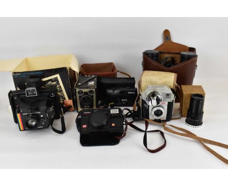 Various cameras and binoculars to include Model D Brownie, Kodak Brownie Flashmite 20, a Polaroid Supercolour Swinger land ca