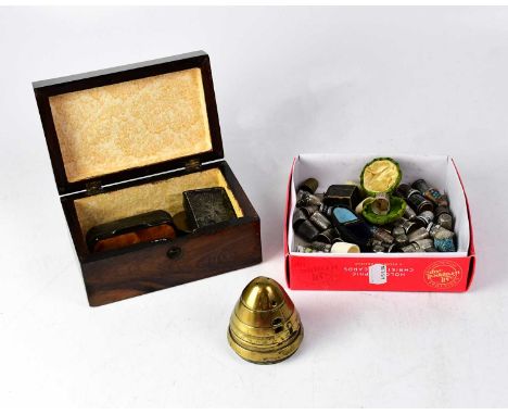 A collection of over sixty thimbles to include hallmarked silver, white metal, ceramic and cloisonné examples, three with ori