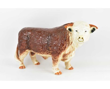 A large ceramic butcher's display bull with ring in nose, unmarked, 24 x 45cm.Condition Report: Crazed.