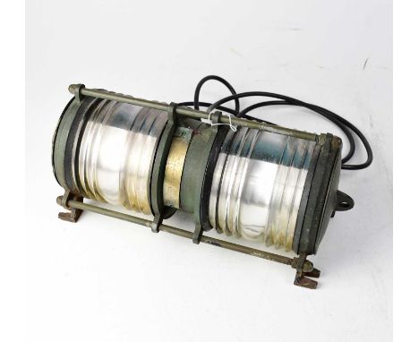 A ship's light, one half of the two lamps with blue, the other half clear, label inscribed 'Direccion General de la Marina Me