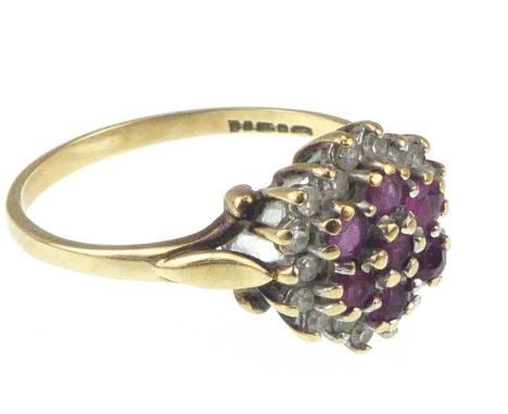 A 9ct gold ruby and diamond cluster ring, size O, approx. 2g.