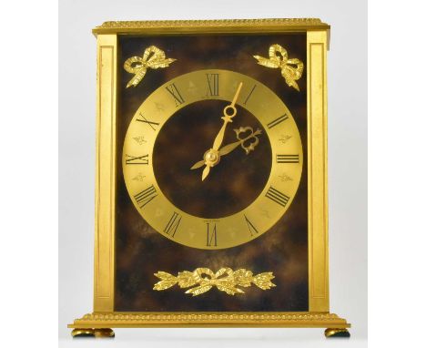 HOUR LAVIGNE; a 20th century French brass cased mantel clock, the circular dial set with Roman numerals, 13cm diameter, gilt 