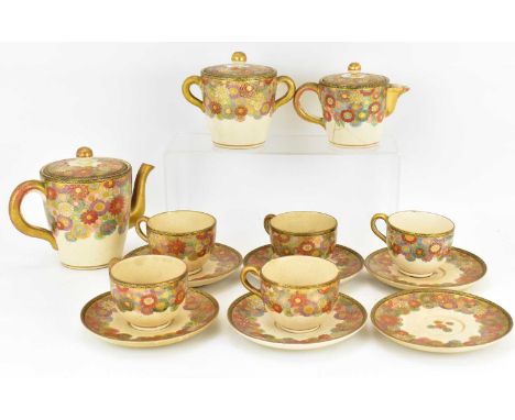 A fourteen-piece Japanese Satsuma tea service, possibly 19th century, comprising six saucers, five cups, milk, sugar, and mil