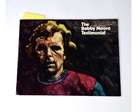 BOBBY MOORE; a copy of 'The Bobby Moore Testimonial' programme bearing signatures to include Bobby Moore, Alf Ramsey, Nobby S