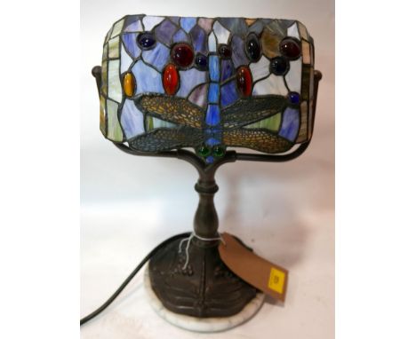 A Tiffany style table lamp, with dragonfly decoration, on circular base, H.40cm 