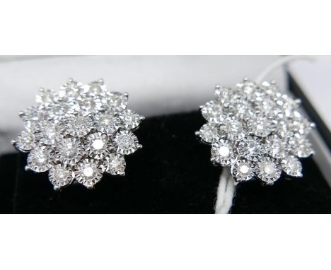 A boxed pair of 18ct white gold, diamond cluster stud earrings (Total: 2 carats), each earring set with 18 brilliant-cut diam