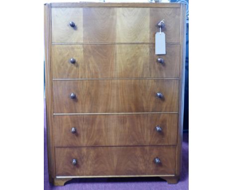 An Art Deco walnut chest of five drawers, raised on bracket feet, H.110 W.85 D.46cm 