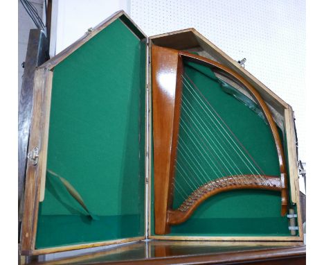 A wooden-cased harp, 70 x 45cm 