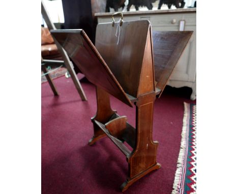 An Edwardian mahogany and inlaid folio stand with book trough fitted under, H.82 W.46cm 