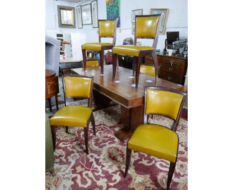 An Art Deco style walnut dining table, with end drawer, raised on twin pillar supports, together with 6 matching chairs 