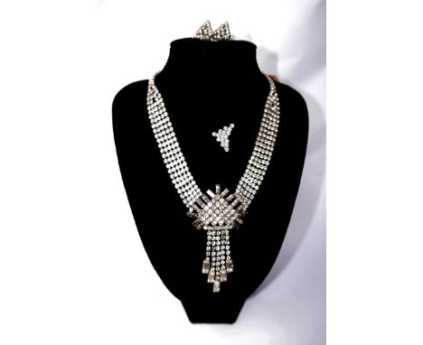 A boxed 1930's diamante tasseled necklace L.40cm, a matching stick pin and matching stud earrings 