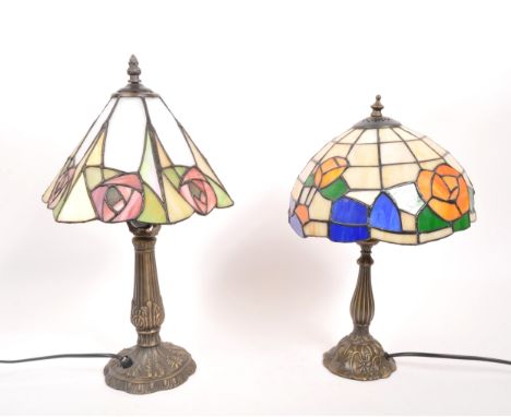 Two vintage 20th century Tiffany style table lamp lights. Stained glass shades with lead sectional. Art Nouveau style lamp ba