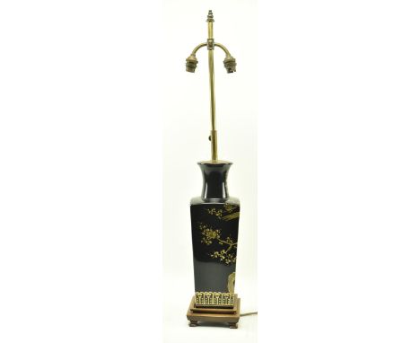 A vintage mid 20th century Chinese ceramic table lamp light. Adjustable twin bulb section stop supported by a brass stem upon