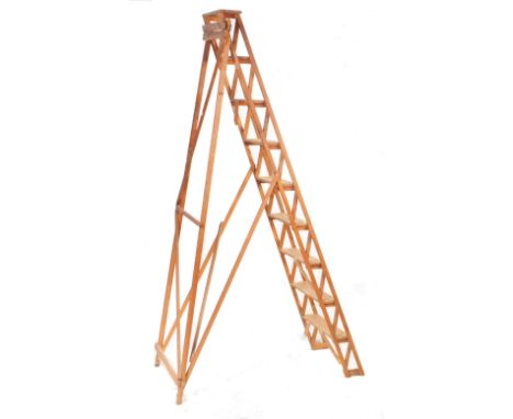 Early 20th century lattice worked wooden ladder. A framed with latticed sides. Measures approx. 220cm x 42cm x 120cm