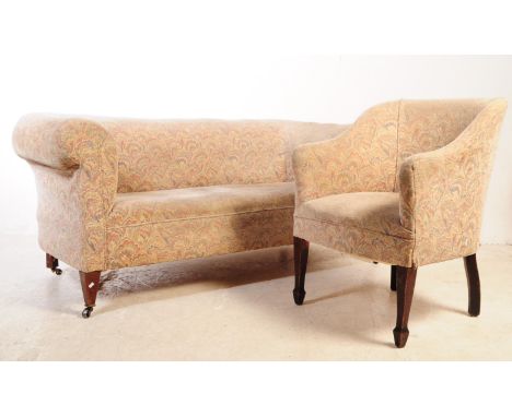 An early 20th century Edwardian chesterfield sofa and tub armchair. The sofa upholstered in polychrome chintz style fabric, h