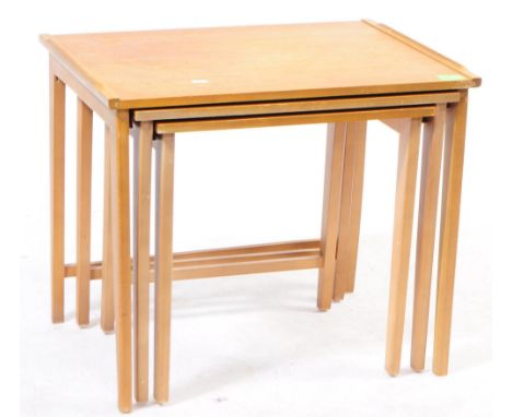 Hurley Furniture - A nest of vintage 20th century teak tables. Rectangular form, raised sides all raised on rectangular taper