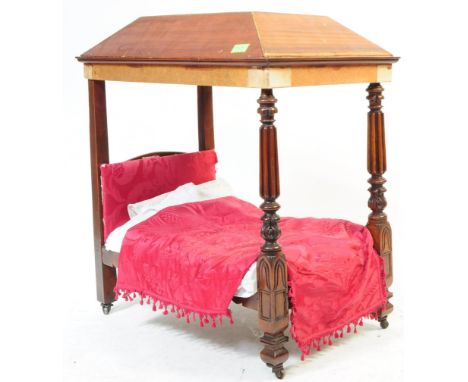 A vintage 20th century apprentice piece four poster double bed. Rectangular form with later chip board canopy , mahogany cons