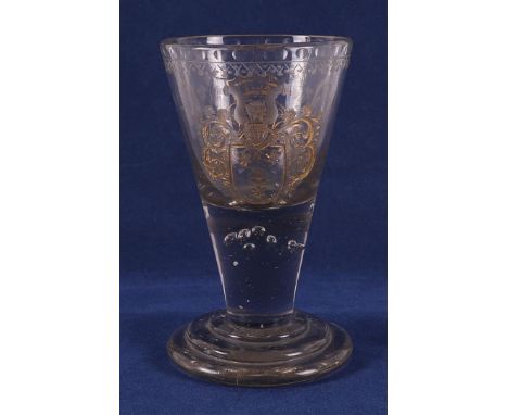 A conical glass ear lamp, Germany 18th century. Wheel engraving with gilding of a coat of arms, verso a double monogram, rest