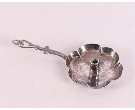Etagere silver. A silver candlestick, 18th century, length 7.5 cm.