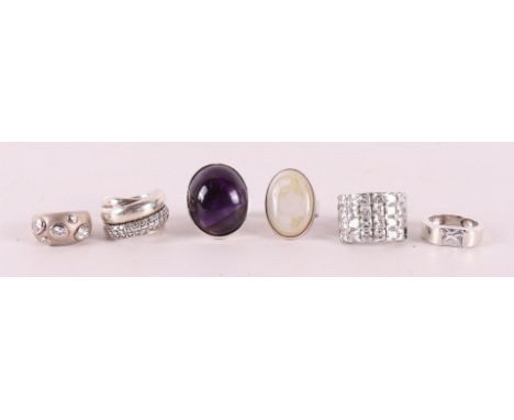 Six different silver vintage rings set with various stones, up to 6x.