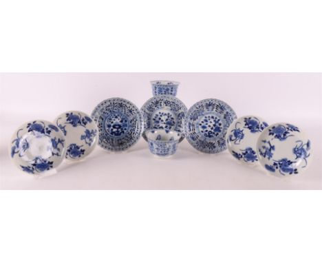 A lot of various blue/white porcelain cups and saucers, China, a.o. Kangxi revival, 19th century. Blue underglaze decoration,