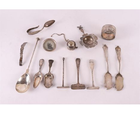 A lot of various silver, including spoons, napkin ring, total approximately 298 grams.