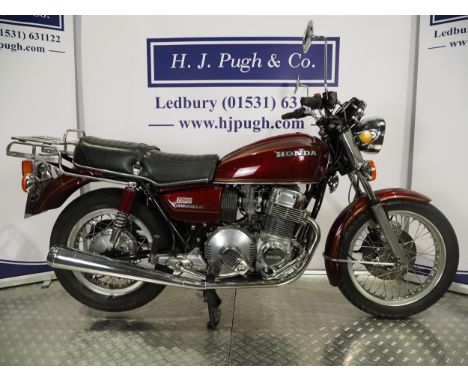 Honda CB750 Auto motorcycle. 1977. 749cc Frame No. CB750 2600368 Engine No. CB750E-2800388 Engine turns over. Comes with shop