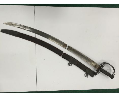 A Georgian Naval sword with ebony handle, brass knuckle guard enclosing scrolled anchor.  The blade in two bits, both cut to 