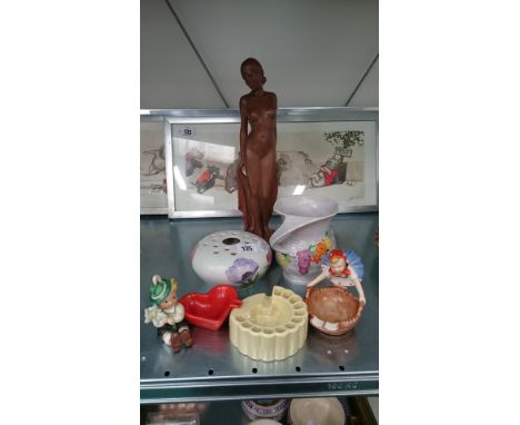 A Goebel china ashtray modelled as a Young Girl wearing red and white spotted scarf together with a similar Boy ashtray and f