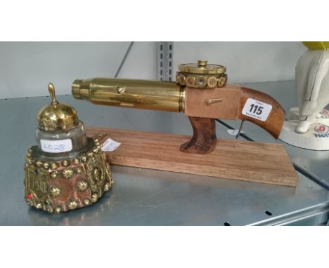 A Trench Art pistol together with a 1918 Trench Art glass inkwell.