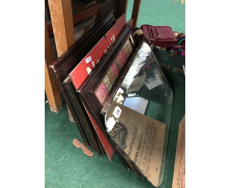 A collection of British Railways carriage mirrors and framed British  Railways ticket displays.