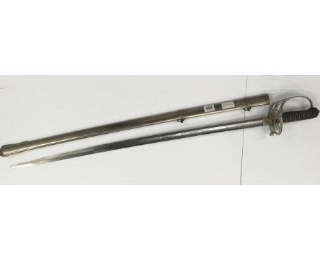 A British Victorian Officer's sword, guard pieced with a crowned bugle and horn, the blade well etched on both sides, plaque 